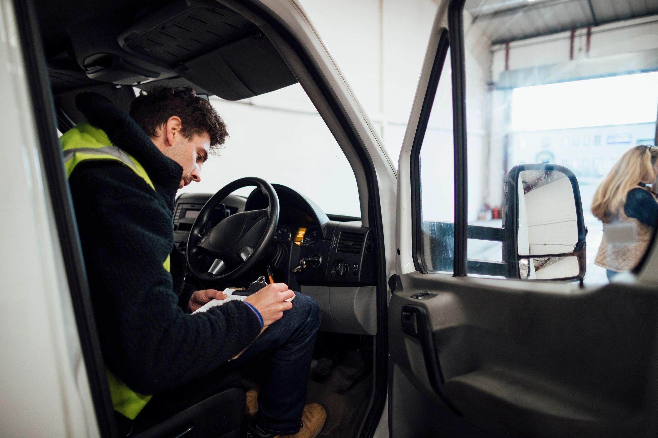 Delivery driver completing a pre-departure checklist