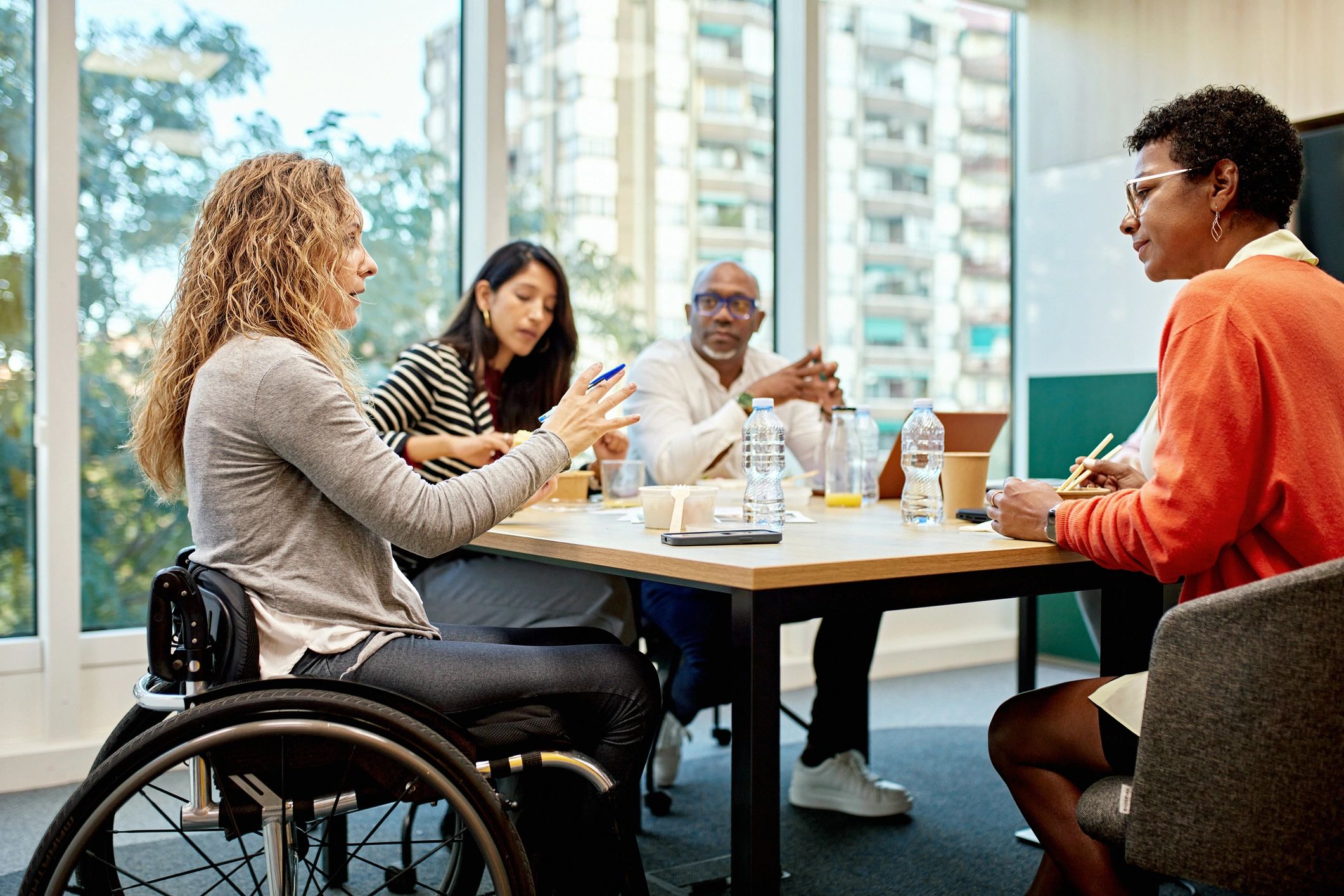 Corporate professionals collaborating around a conference table