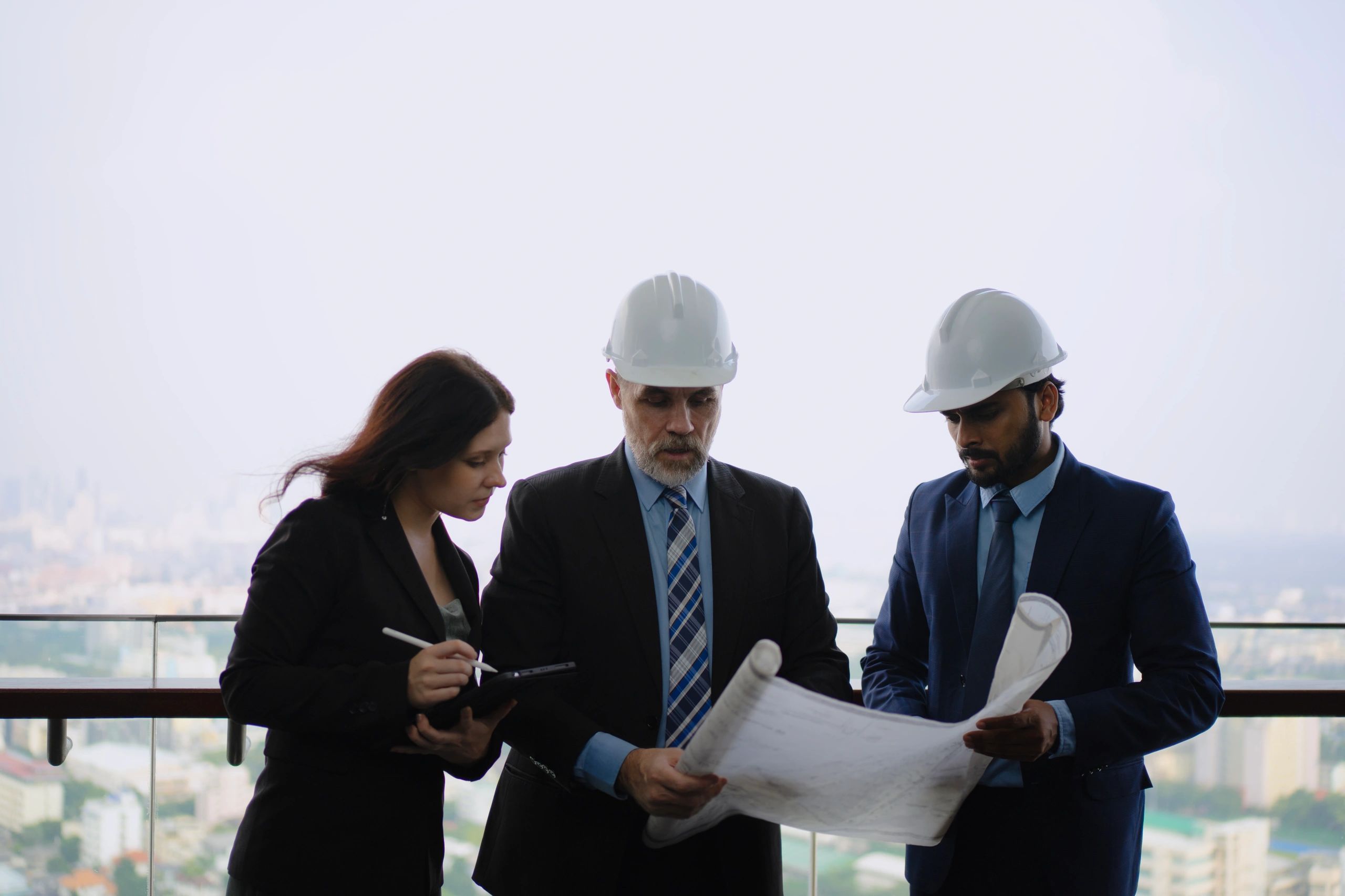 Construction professionals collaborating in a modern workplace