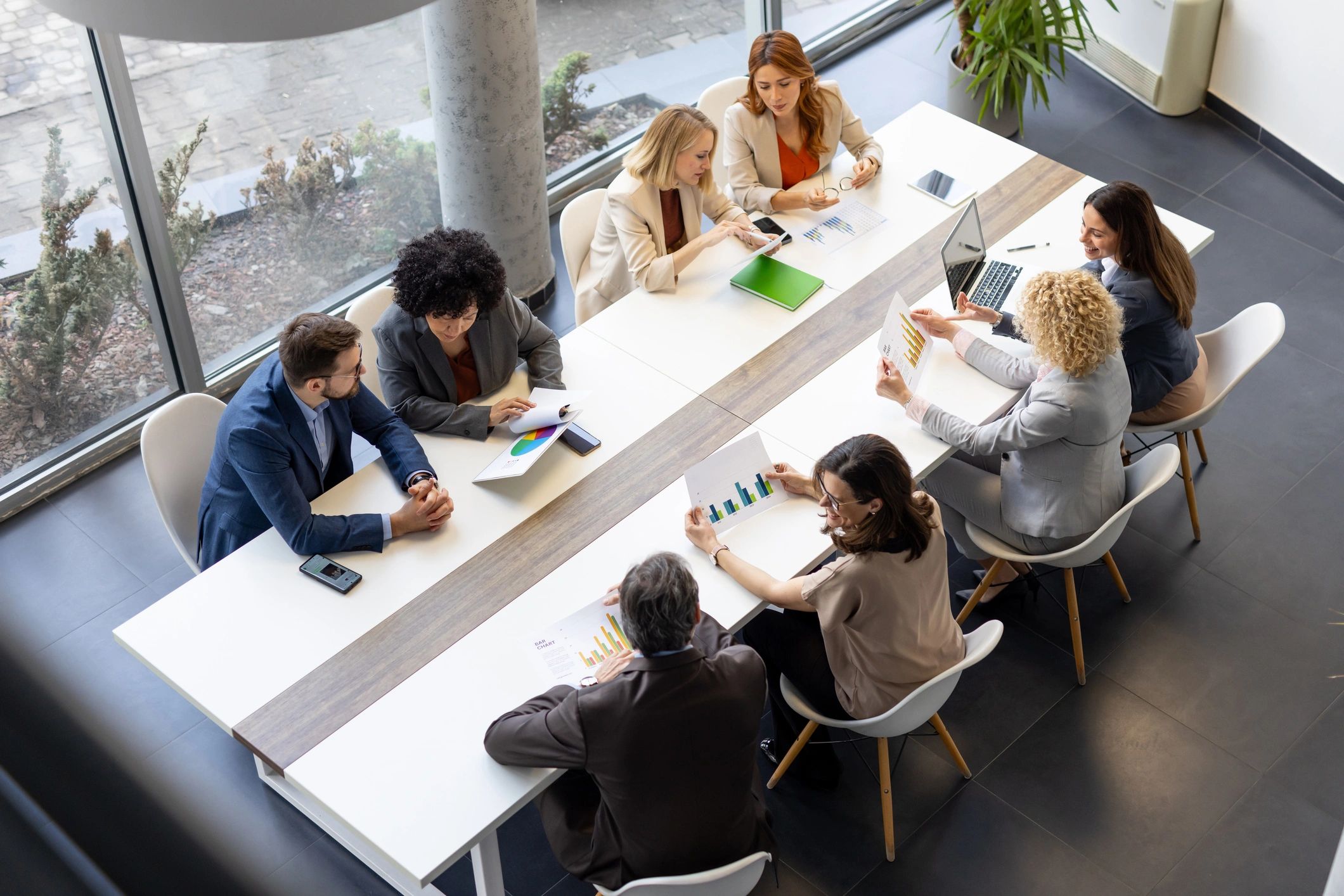 Professionals collaborating in a modern business meeting