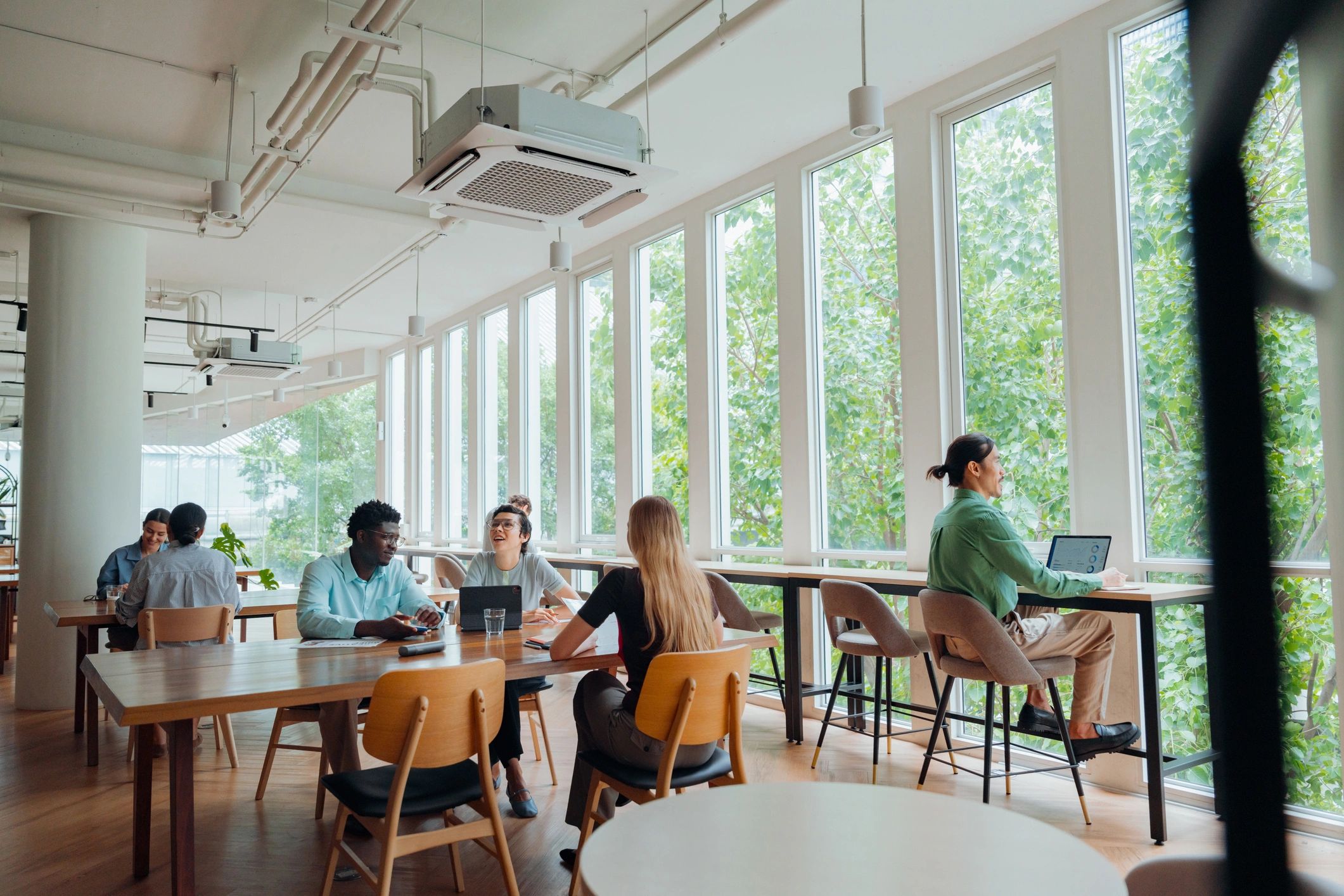 Diverse professionals collaborating in a modern workplace